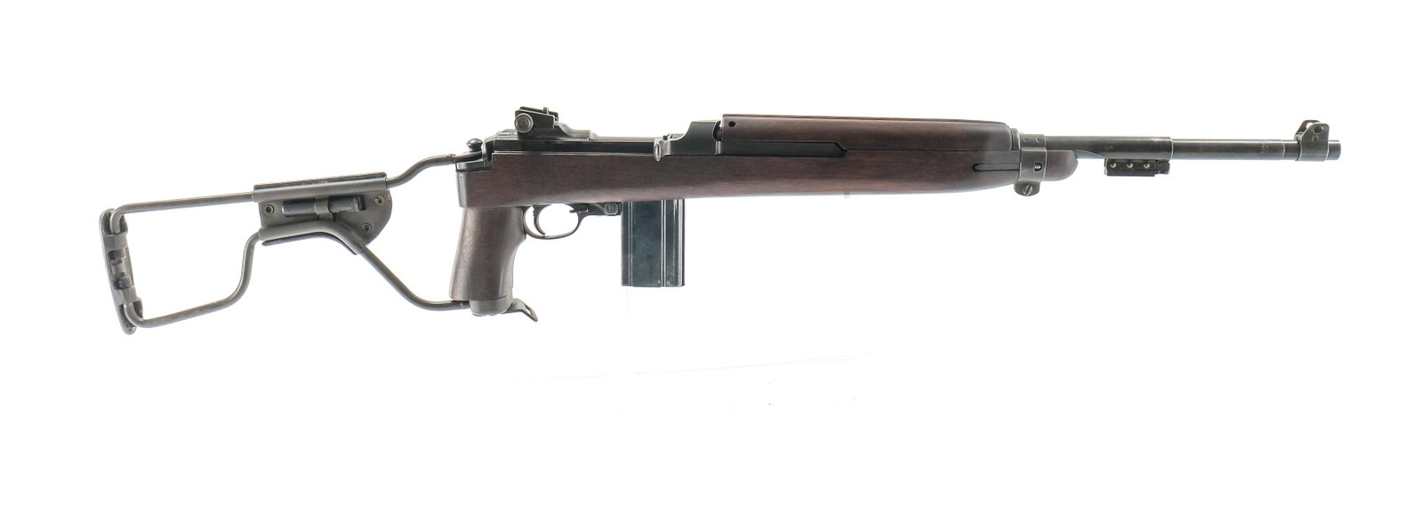 Inland M1 Carbine Paratrooper M1A1 Rifle: M1 Carbine paratrooper with early Inland receiver serial number. GM barrel. A very good reproduction wood stock. Probably a rearsenal-ed (later safety, bayo lug, mag release) war time M1 carbine mated