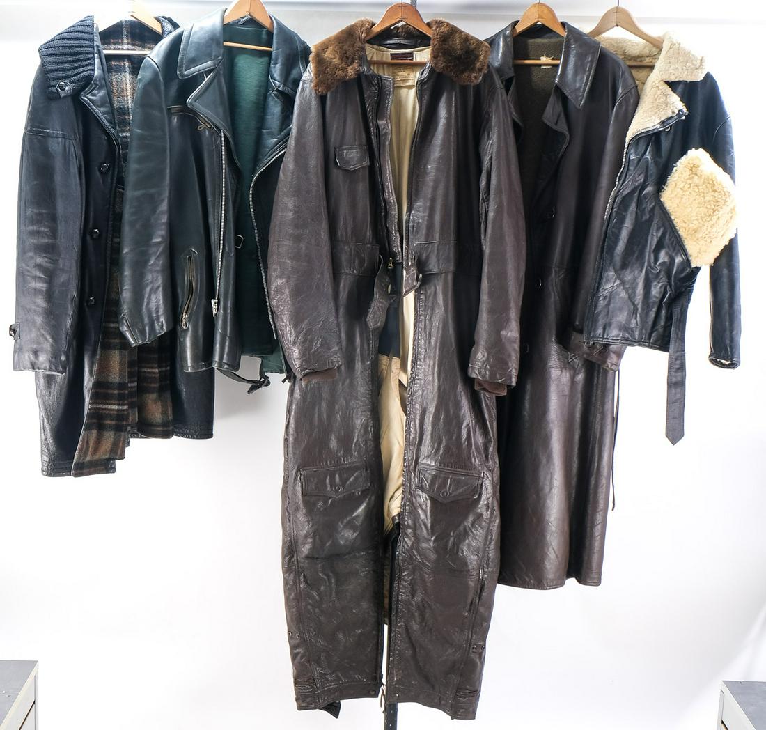 Leather Jackets, Coat, Military Flight Suit: Estate-Fresh group consisting of Three Leather Jackets, one Trench coat, and a Colvinex US Navy CFN24 Size 42 Heated Leather Flight Suit. One unmarked Shearling Lined Pilot or crew Jacket with Lightni