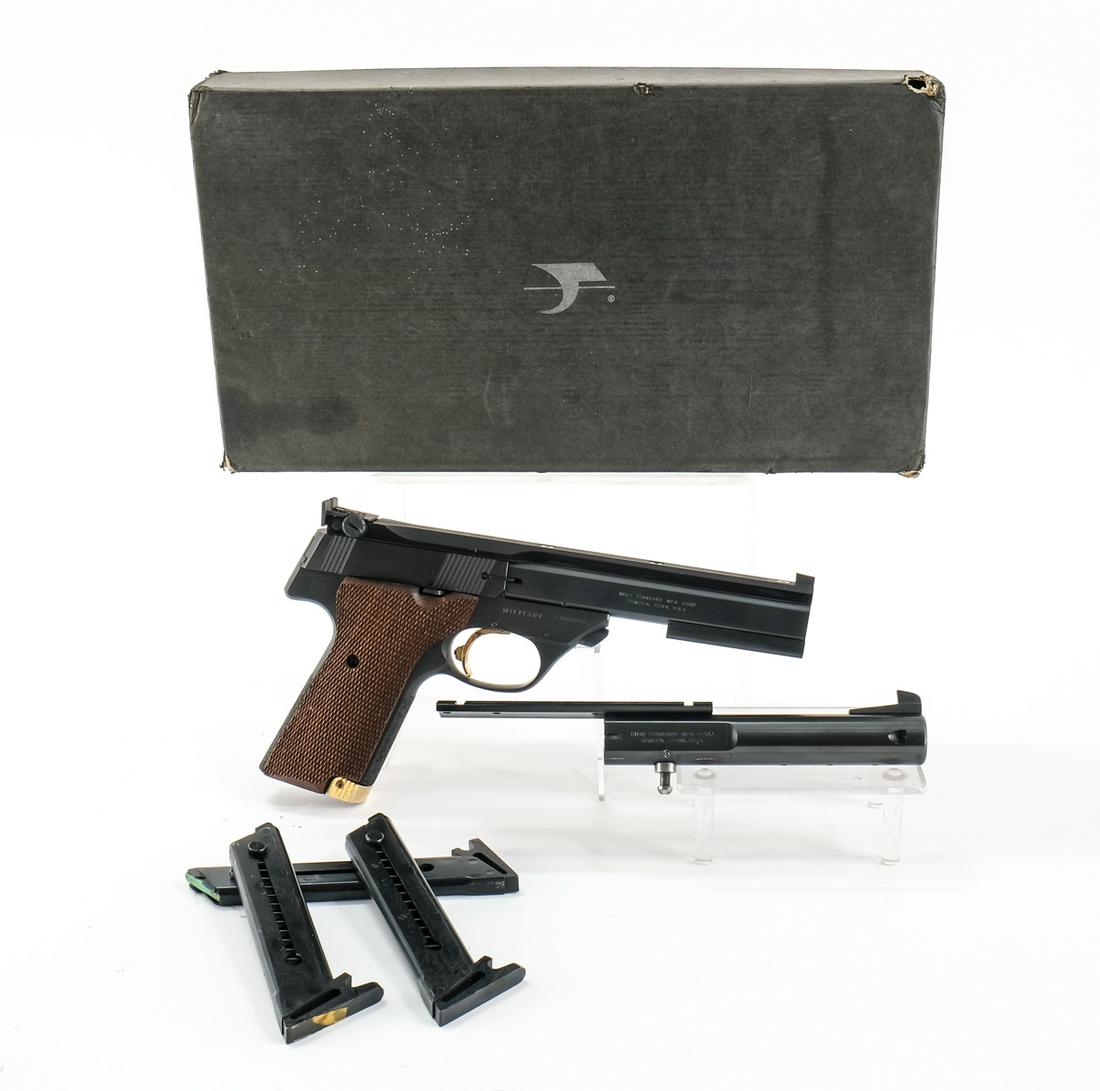 High Standard The Victor "Military" .22 LR Pistol: High Standard "The Victor" "Military" in .22 long rifle with four, ten round removable magazines and a 5.5" barrel. Sharp clean checkered wood grip plates with left side thumb rest. Frame with light s