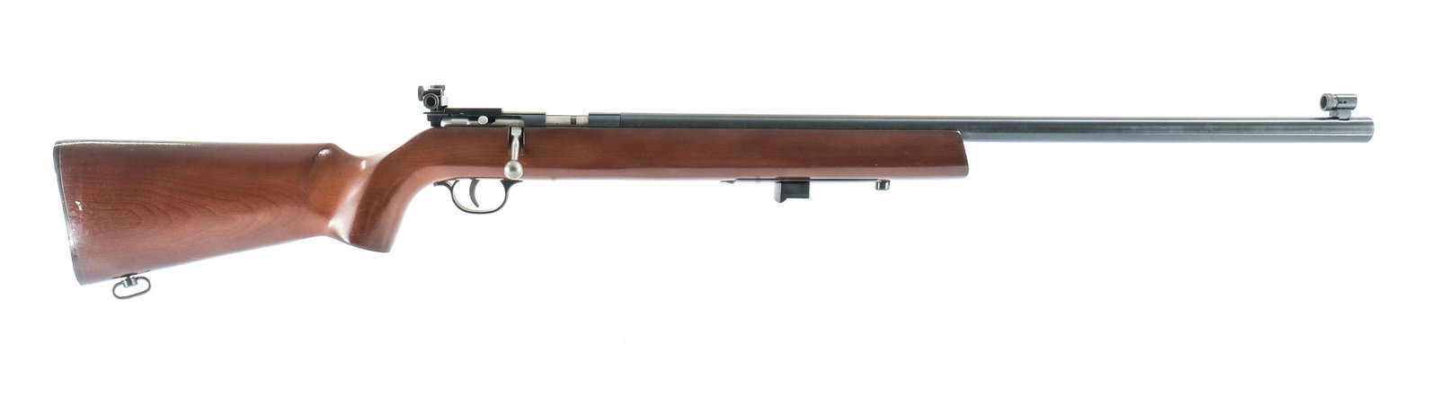 Anschutz-Savage Arms Mark 12 .22 LR Rifle: Anschutz Savage Arms model Mark 12 in a single shot .22 long rifle with a 26" barrel. The plastic serrated butt plate has no damage or heavy scratches. The wood one piece Monte Carlo style stock has a