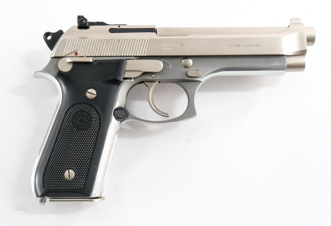 Taurus PT 99 AF 9mm Pistol: Taurus model PT 99AF in 9mm with one fifteen round removable double stacked magazine and a 5" barrel. The trademarked polymer grip plates have very light handling wear and sharp checkering. Frame has 