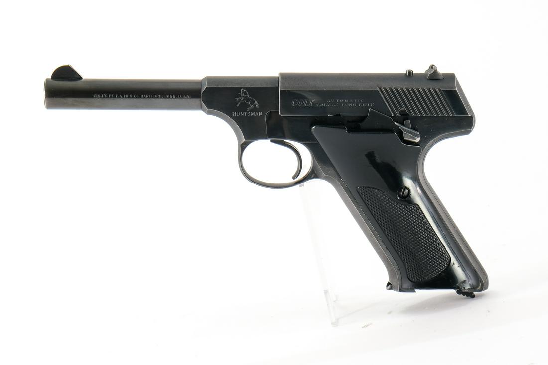 Colt Huntsman .22 LR Pistol: Colt Huntsman in .22 long rifle with a ten round removable magazine and a 4.5" barrel. "Colt" polymer grip plates with light wear, scuffs and scratches no cracks or chips. The blued frame has light sc
