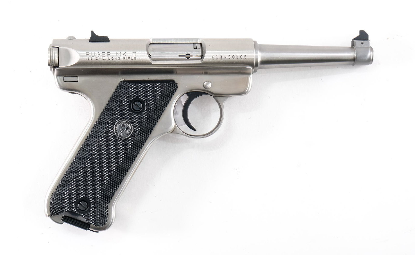 Ruger Mark 2 .22 LR Pistol: Ruger model Mk II in .22 long rifle with one, ten round removable magazine and a 6" barrel. Grip plates have sharp clean checkering. Polished steel frame has light surface scuffs and scratches. Rear a