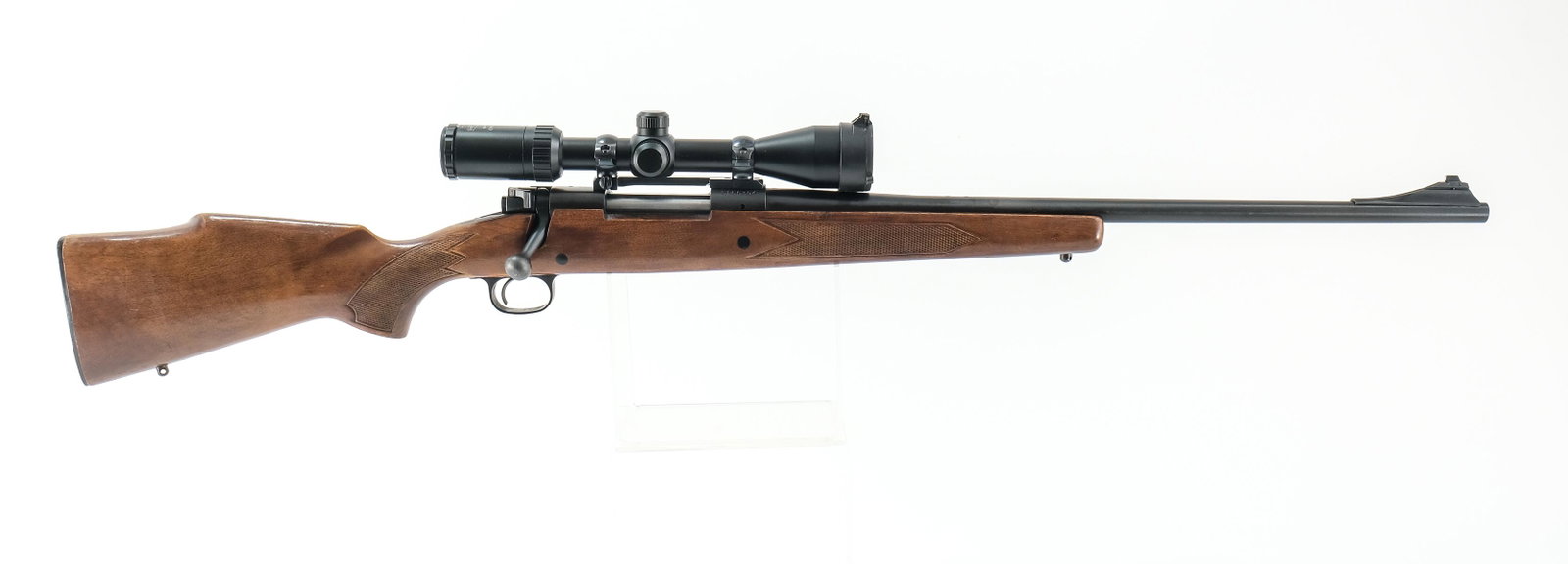 Winchester 670A .30-06 Bolt Rifle: Winchester model 670 A in .30-06 Springfield with a three shell internal capacity and a 22" barrel. Butt-plate has moderate handling wear. Monte Carlo style butt-stock has light scratches and dings, n