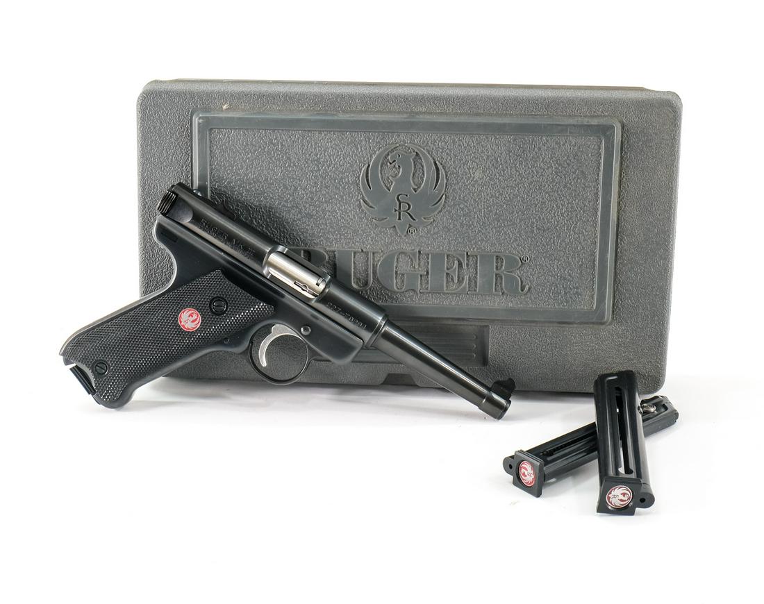 Ruger Mark 3 .22 LR Pistol: Ruger Mk III in .22 long rifle with three, ten round removable magazines and a 4" barrel. "Ruger" grip plates with sharp clean checkering. Black frame has a few surface scuffs. Barrel is clean and fre