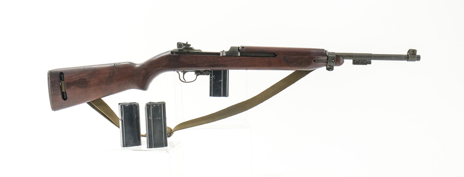 Standard Products M1 Carbine .30 CAL Rifle: Standard Product model M1 Carbine in .30 caliber with three, fifteen round removable magazines and a 18" barrel. Barrel is proofed "Underwood" 2-44. Metal butt plate has a touch of metal oxidation oth