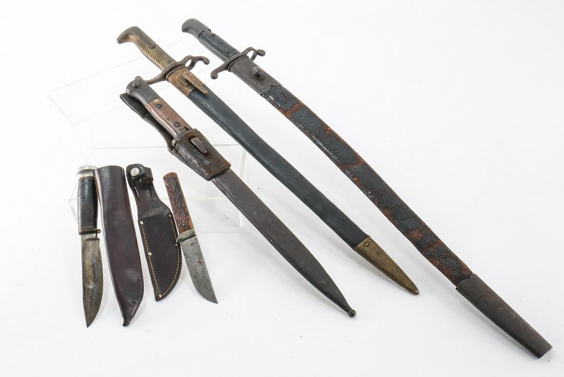 Bayonet & Knife Lot 5pcs: Description This lot is for three bayonets and two small knives. Knife with 5" blade marked "Marbles", 4" blade is marked "Cattaraugus" 9 1/2" bayonet marked "Aug. Kupper Soligen", 18 1/2" marked "Gle