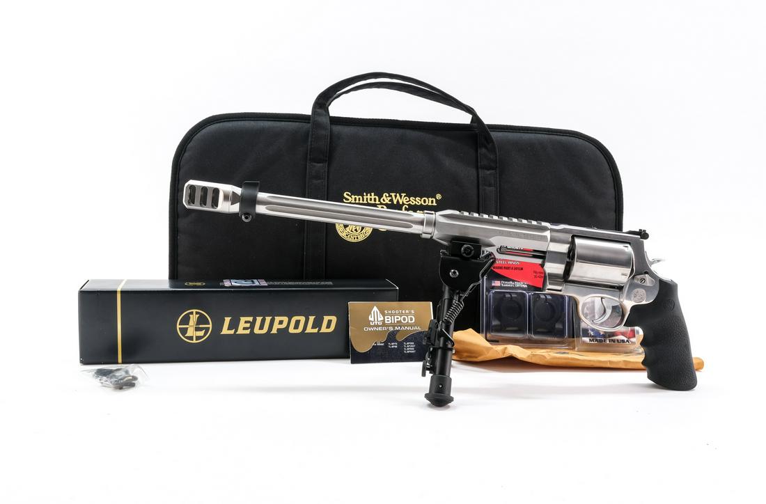 Smith & Wesson PC 460 Hunter Revolver: Description S&W Performance Center .460 Magnum Hunter Revolver. Matte and Polished Stainless Steel with 14" Fluted & Compensated bbl. Top and bottom Accessory Rails, mounted bipod, and S&W Rubber Grip