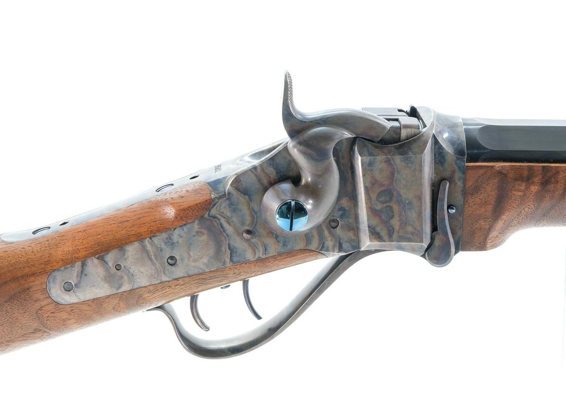 Shiloh Sharps 1874 Hartford .45-70 Rifle: Description Shiloh Rifle Mfg Co of Big Timber Montana proudly makes reproductions of the famous Sharps rifles of the late 1800's. This one has a 34" heavy octagon high polished blue barrel, front sigh
