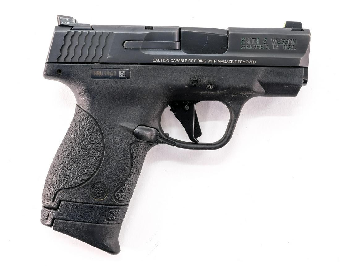 Smith & Wesson M&P 9 Shield 9mm Pistol: Description Smith & Wesson model M&P 9 Shield in 9mm with one, eight round removable magazine and a 3" barrel. Composite frame, grip, trigger and guard. Black metal slide and barrel. Left side frame s