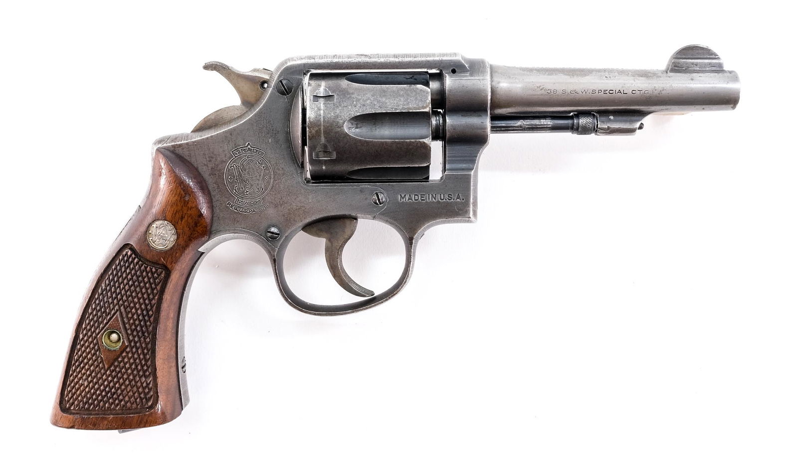 Smith & Wesson Victory .38 SPL Revolver: Description Smith & Wesson model Victory in .38 SPL (Special) with a six round capacity and a 4" barrel. Checkered wooden grip plates. Blued metal frame, cylinder and barrel. Case colored checkered ha