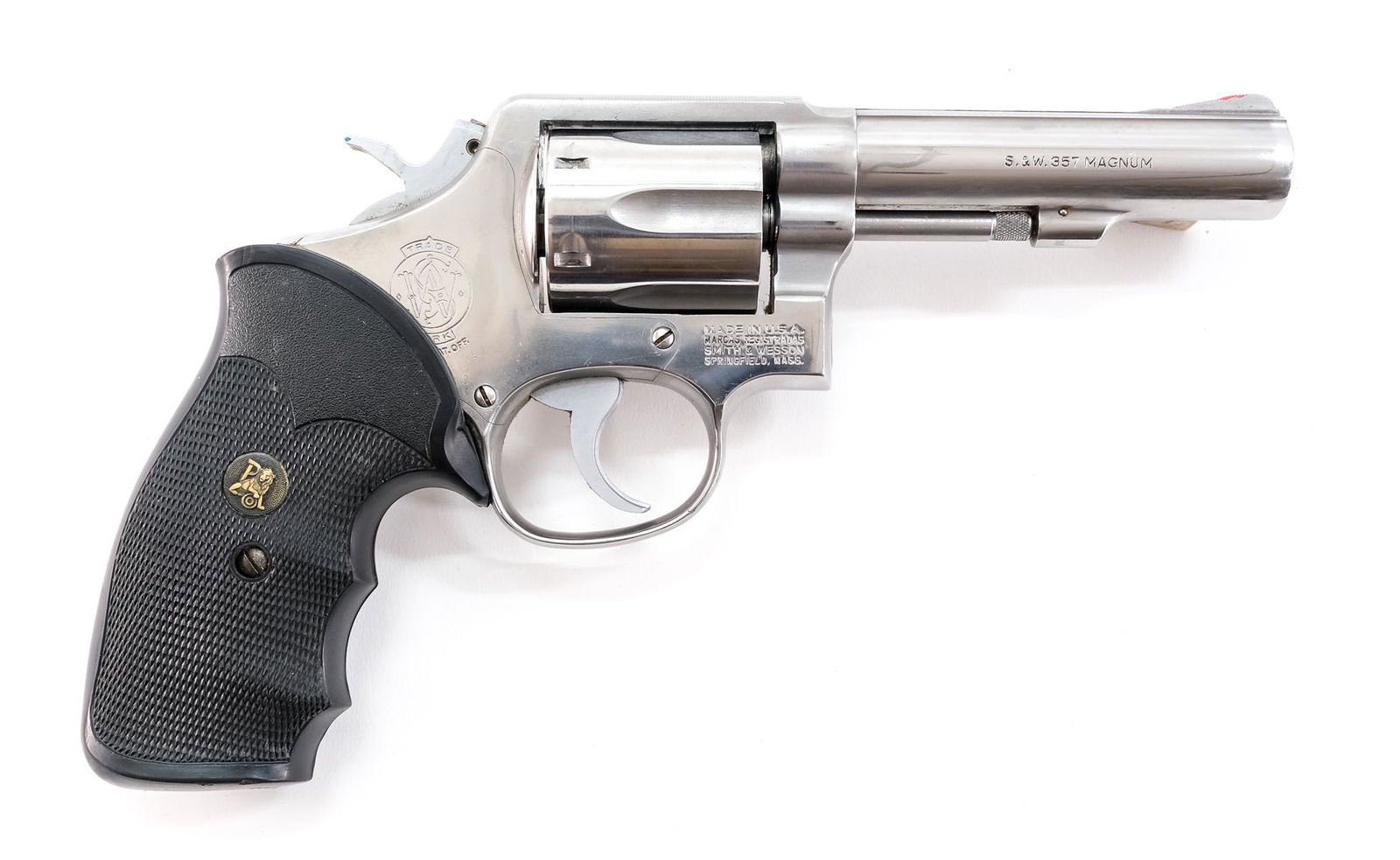 Smith & Wesson 65-3 .357 MAG Revolver: Description Smith & Wesson model 65-3 in .357 Magnum with a six shot capacity and a 4" barrel. Rubber checkered "Pachmayr" "Gripper" grips. Stainless steel frame, cylinder and barrel. Checkered hammer