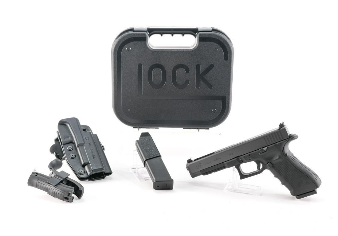Glock 34 Gen 4 9mm Pistol: Description Glock model 34 Gen4 in 9mm with two, ten round removable magazines and a 5.25" barrel. One piece frame with interchangeable backstrap in excellent clean condition with no marks. Black fini