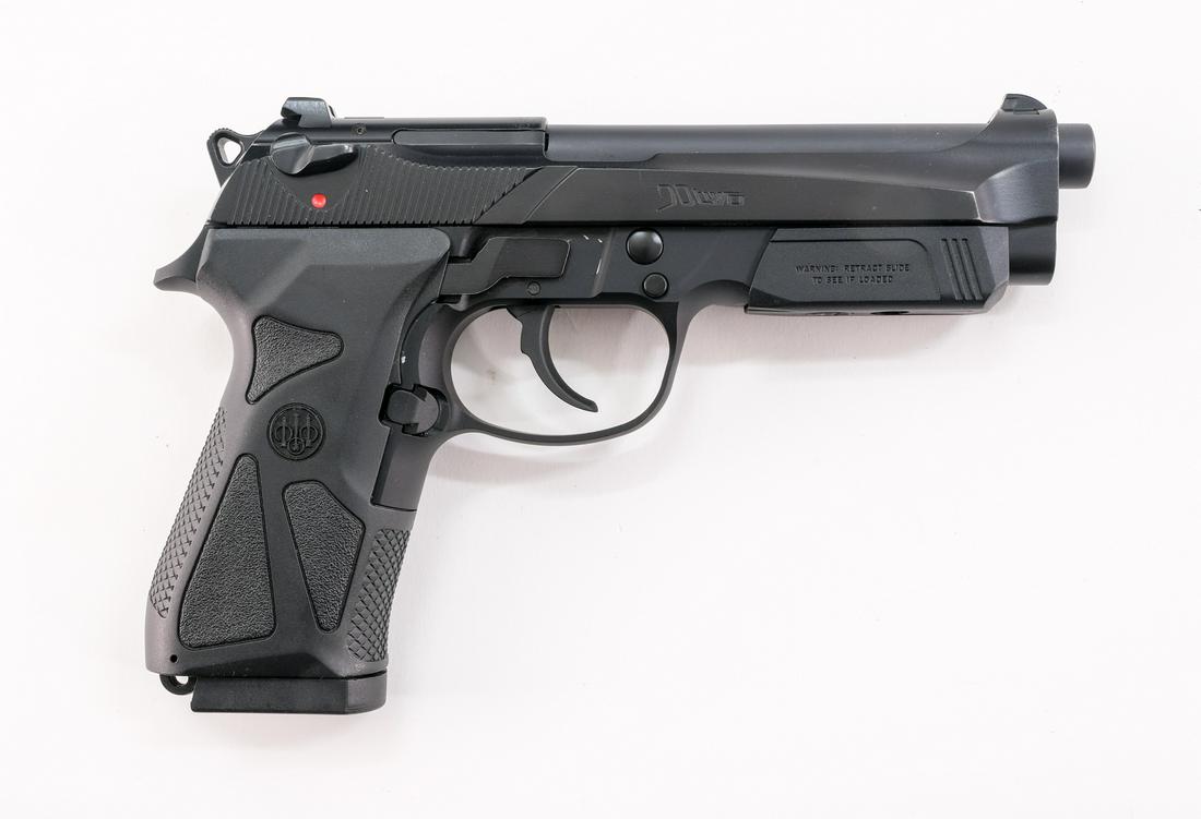 Beretta 90-Two 9mm Semi-Auto Pistol: Description Beretta model 90-Two in .9mm with two, seventeen round removable magazines and a 5" barrel. Composite grip plates and black metal finished frame, slide and barrel. Ambidextrous safety swit