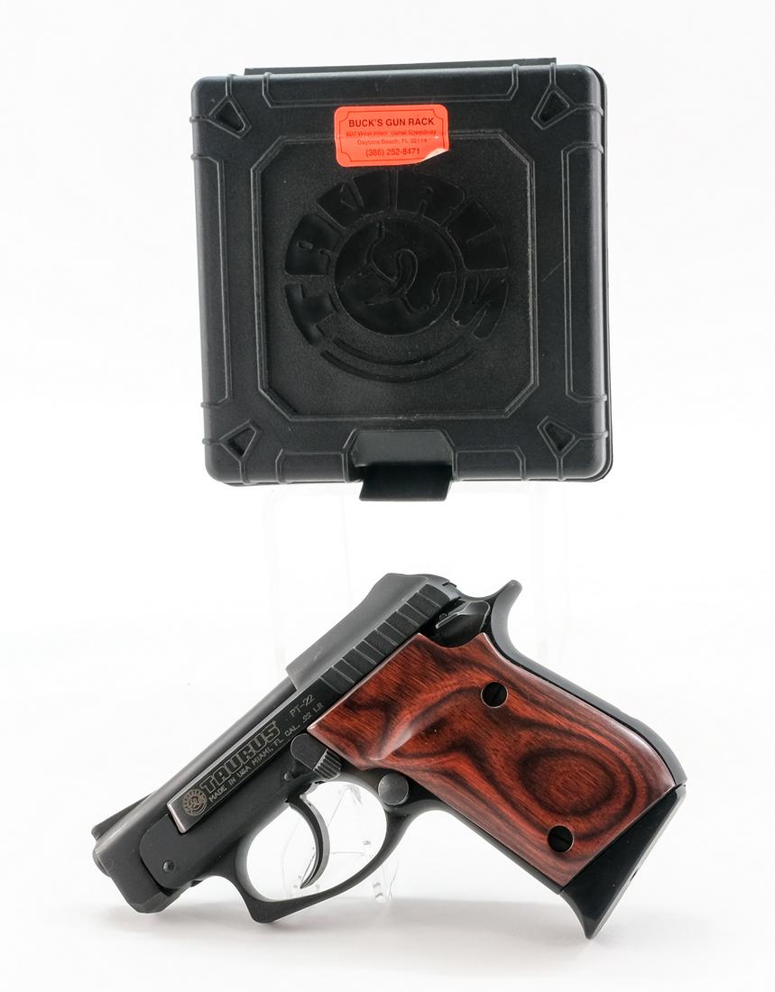 Taurus PT-22 .22 LR. Semi-Auto Pistol: Description Taurus model PT-22 in .22 long rifle with one, eight round removable magazine and a 2 3/4" barrel. Premium solid wood smooth grip plates. Black finished metal frame and slide. Left side of