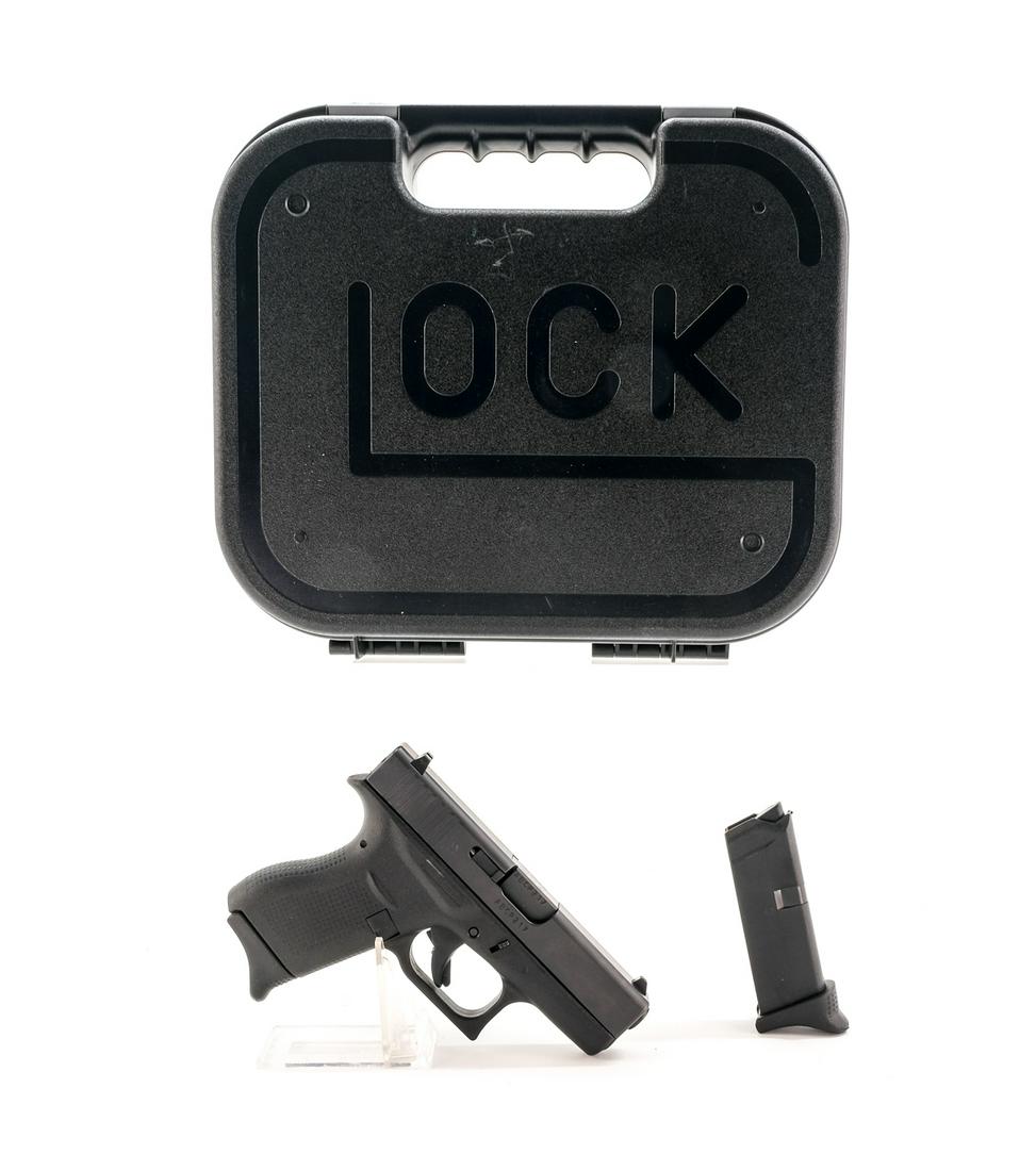 Glock 42 .380 Auto Semi-Auto Pistol: Description Glock model 42 in .380 Auto with two six round removable magazines and a 3 1/4" barrel. Composite frame and dimpled hand grips. Left side of frame push button magazine release and trigger 