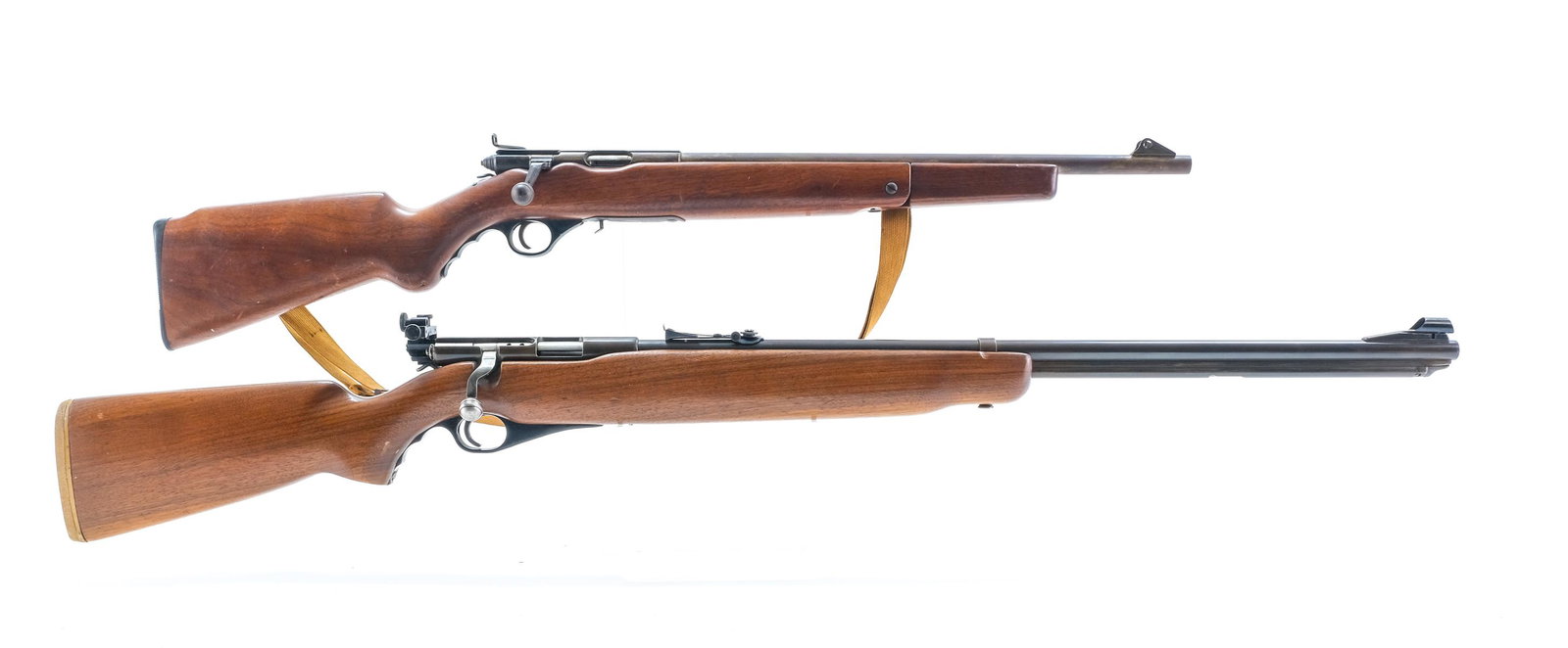 Two Mossberg 46B & 142A .22 Bolt Action Rifles: Description Mossberg model 46B and Mossberg model 142-A in .22 caliber long, short and long rifle. The 142-A has a 18" barrel and takes seven .22 short and long rifle cartridge's only. The 46B takes .