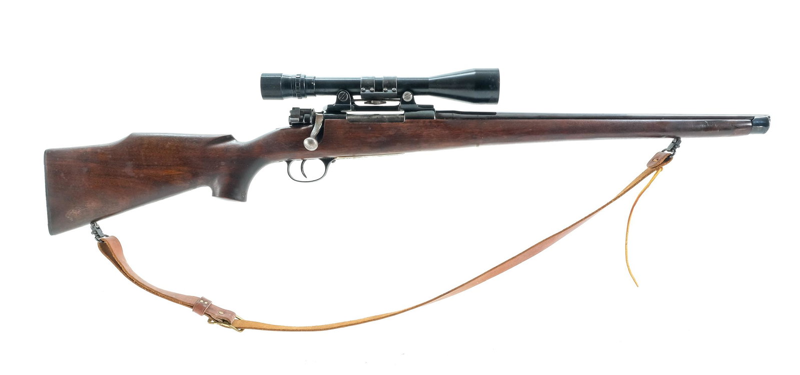 Mauser Type Bolt Action Rifle 7mm: Description PENDING Chamber casting for caliber. Unknown Mauser Type bolt action rifle with a four round capacity and a 19" barrel. Plastic butt plate, Monte Carlo style wood butt stock and foregrip. 