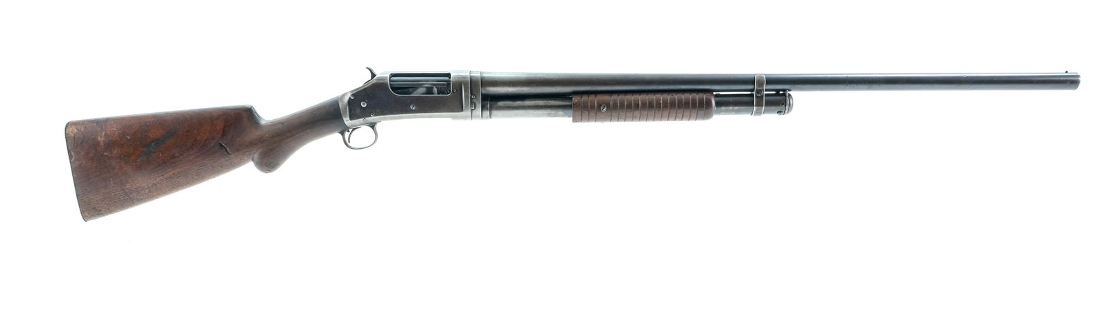 Winchester 1897 12 GA Pump Shotgun: Description Winchester model 1897 in 12 gauge with a six round shell capacity and a 30" (FULL) Choke smooth bore barrel. Metal butt plate, hardwood butt stock and corn cob serrated foregrip. Blued rec