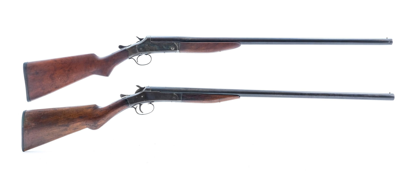 Two Springfield American Gun Co. 12 GA Shotguns: Description This lot is for two single shot shotguns. Springfield Arms Co. single shot 12 gauge shotgun with a 30" smooth bore barrel. Plastic butt plate, hardwood stock and foregrip. Case colored rec