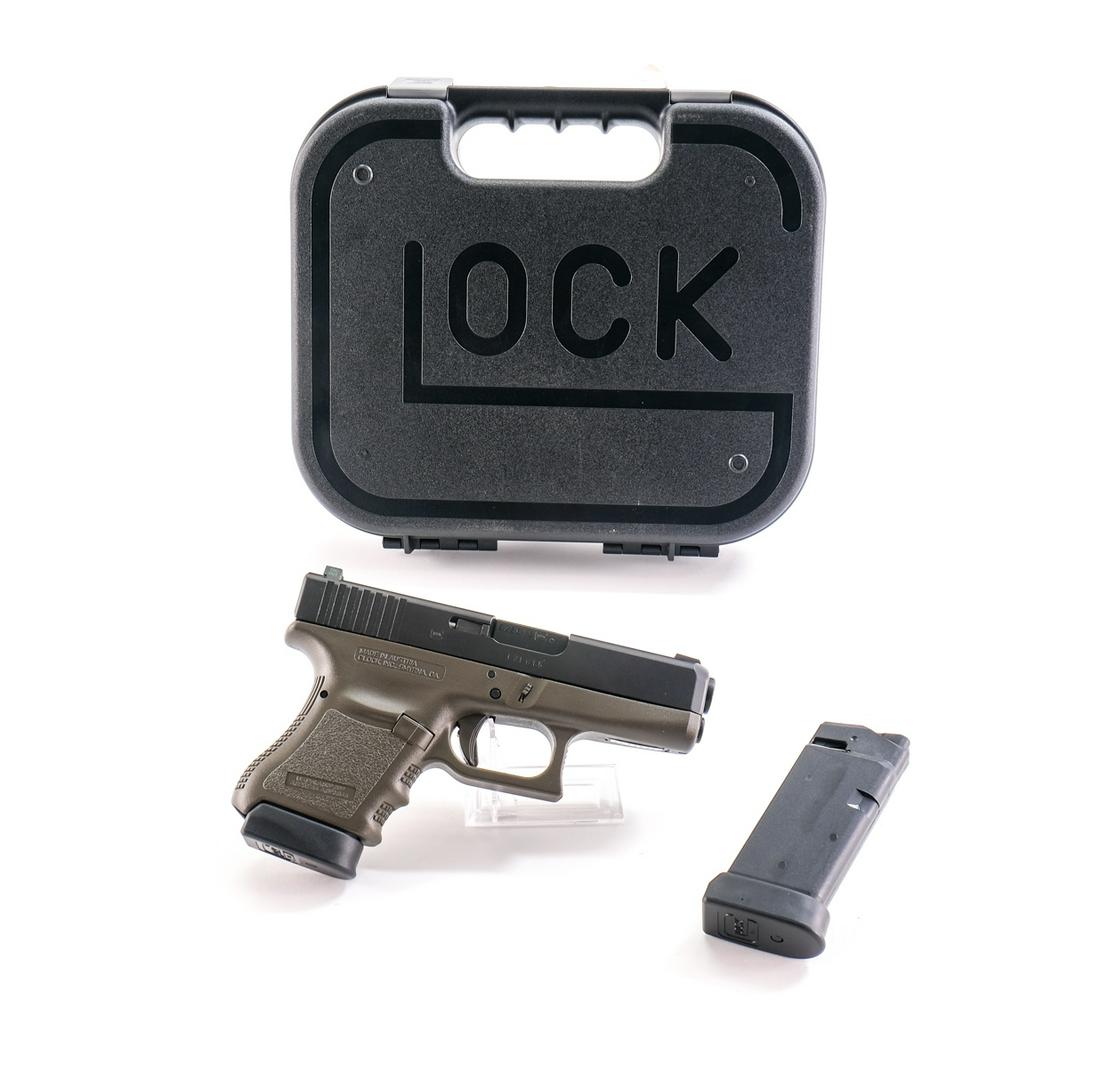 Glock 36 Custom .45 Semi Auto Pistol: Description Glock model 36 Custom in 45 Auto with two, six round removable magazines and a 3.5" barrel. This pistol has been professionally cerakoted with a Army green frame and trigger. Two tone with
