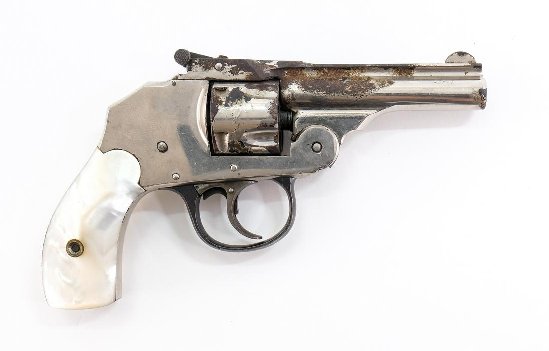 Iver Johnson Top Break .32 Revolver: Description Iver Johnson Top Break in .32 caliber with a five round capacity and a 3" barrel. Real mother of pearl grip plates. Nickel plated frame, cylinder and barrel. Fixed front blade sight. This