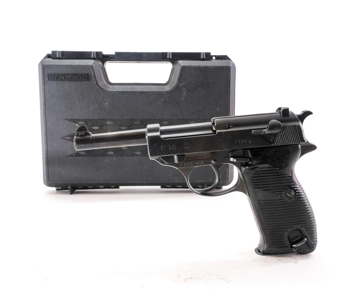 Walther P38 9mm (1942) Semi-Auto Pistol: Description Walther model P38 in 9mm with one, eight round removable magazine with a 5" barrel. Made in Germany and imported by C.A.I. (Century Arms International) out of Georgia VT. Serrated composit