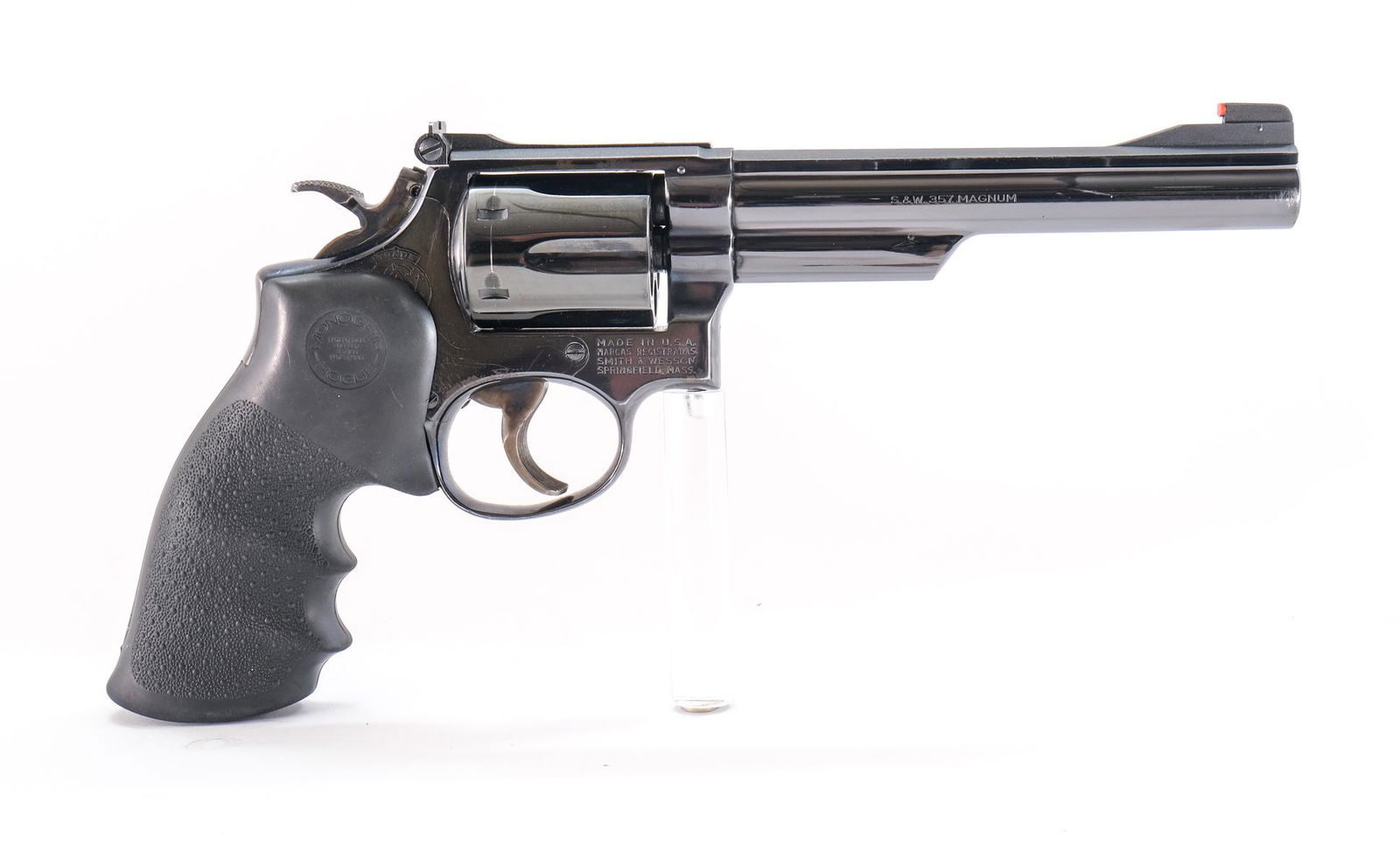 S&W 19-3 .357 Mag Revolver: Description Smith & Wesson model 19-3 in .357 magnum with a six shot capacity and a 6" barrel. Aftermarket rubber dimpled Hogue Monogrip. Blued frame, cylinder and barrel. Case colored wide serrated t