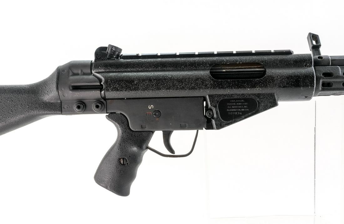 Federal Arms FA91 .308 Cal Semi-Auto Rifle: Description Federal Arms FA91 in .308 caliber missing its removable magazine with a 18" barrel. The barrel has a ported muzzle device. Serrated composite butt plate. Composite stock and front foregrip