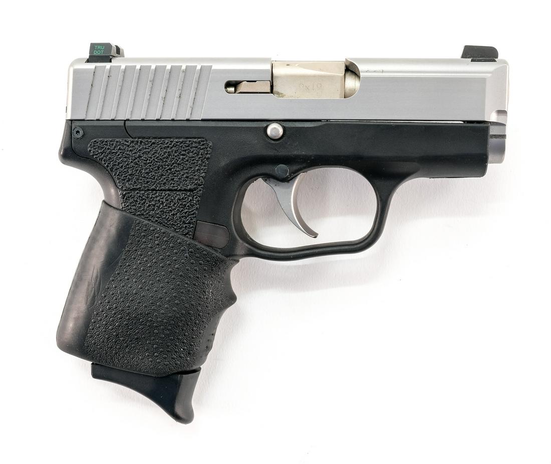 Kahr PM9 9mm Semi-Auto Pistol: Description Kahr model PM9 in .9mm with one, six round removable magazine and a 3" barrel. Composite frame with rubber grip wrap. Metal slide, barrel and smooth trigger. Left side of frame push button