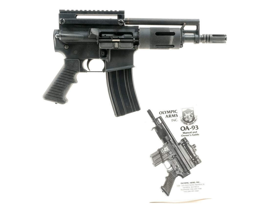 Olympic Arms OA 93 .223 5.56 Semi-Auto Pistol: Description Olympic Arms Model OA-93 in .223 / 5.56 with one, thirty round (High Capacity) removable magazine with a 7" barrel. Serrated composite pistol grip with accessories door in end of grip. Mat