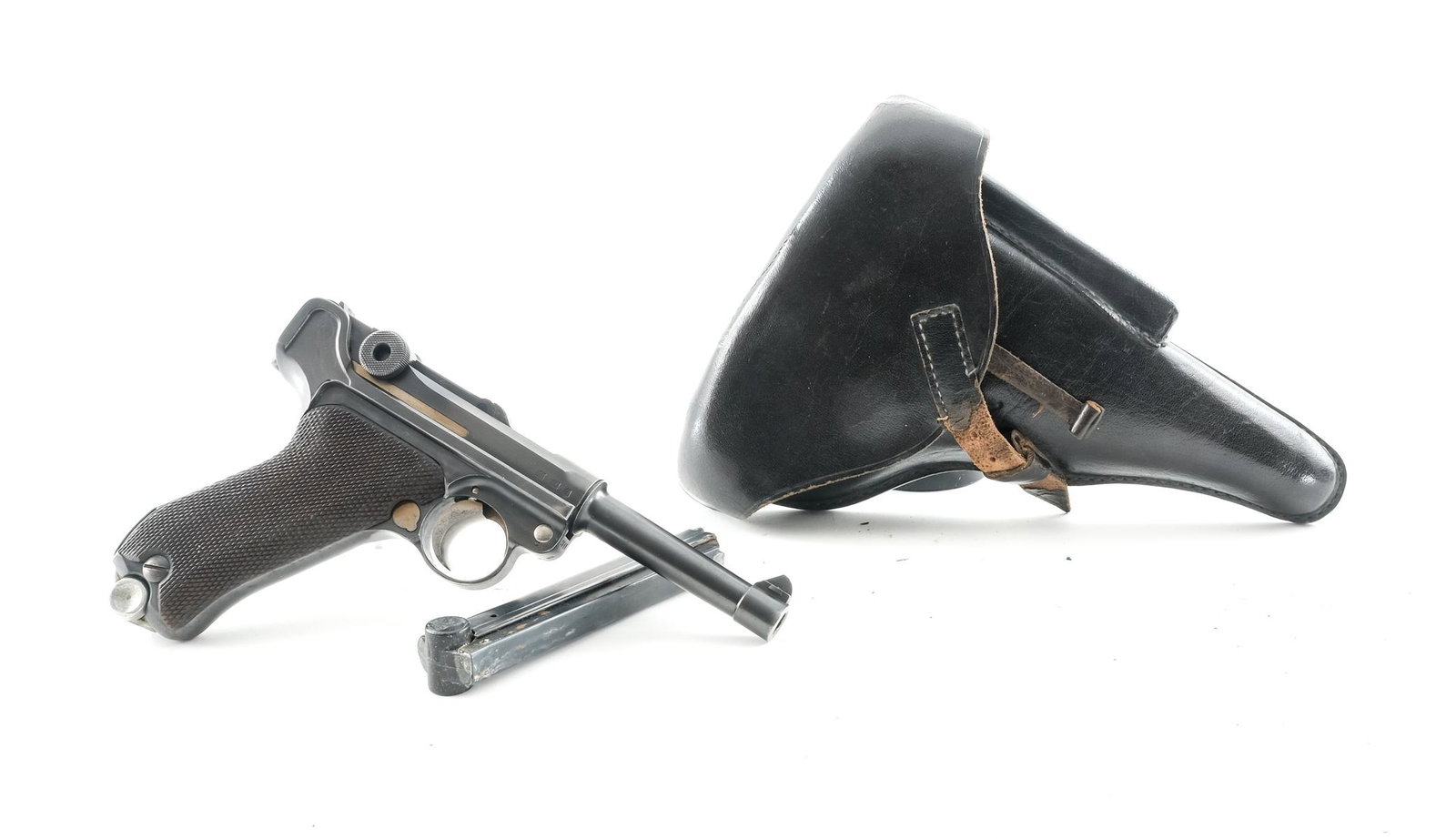 German Luger P08 9mm Semi-Auto Pistol: Description Mauser made Luger P08 in 9mm with two, eight round removable magazines and a 4" barrel. S/42 G marked barrel. Checkered wood grip plates. Blued frame and barrel. Checkered charging handle 