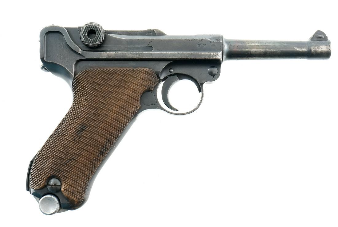 WWII Mauser S/42 Code Luger Semi Auto Pistol 9mm: Description WWII Mauser S/42 code model P08 Luger semi auto pistol chambered in 9mm. Marked "1938", this visible numbers matching example features a 4" barrel with dove tailed front blade and v-notch 