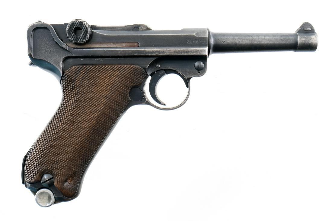 WWII Mauser "byf 42" Code P08 Semi Auto Pistol 9mm: Description WWII German Mauser model P08 Luger semi auto pistol chambered in 9mm. Marked "byf 42", this visible numbers matching example features a 4" barrel with dove tailed front blade and v-notch r