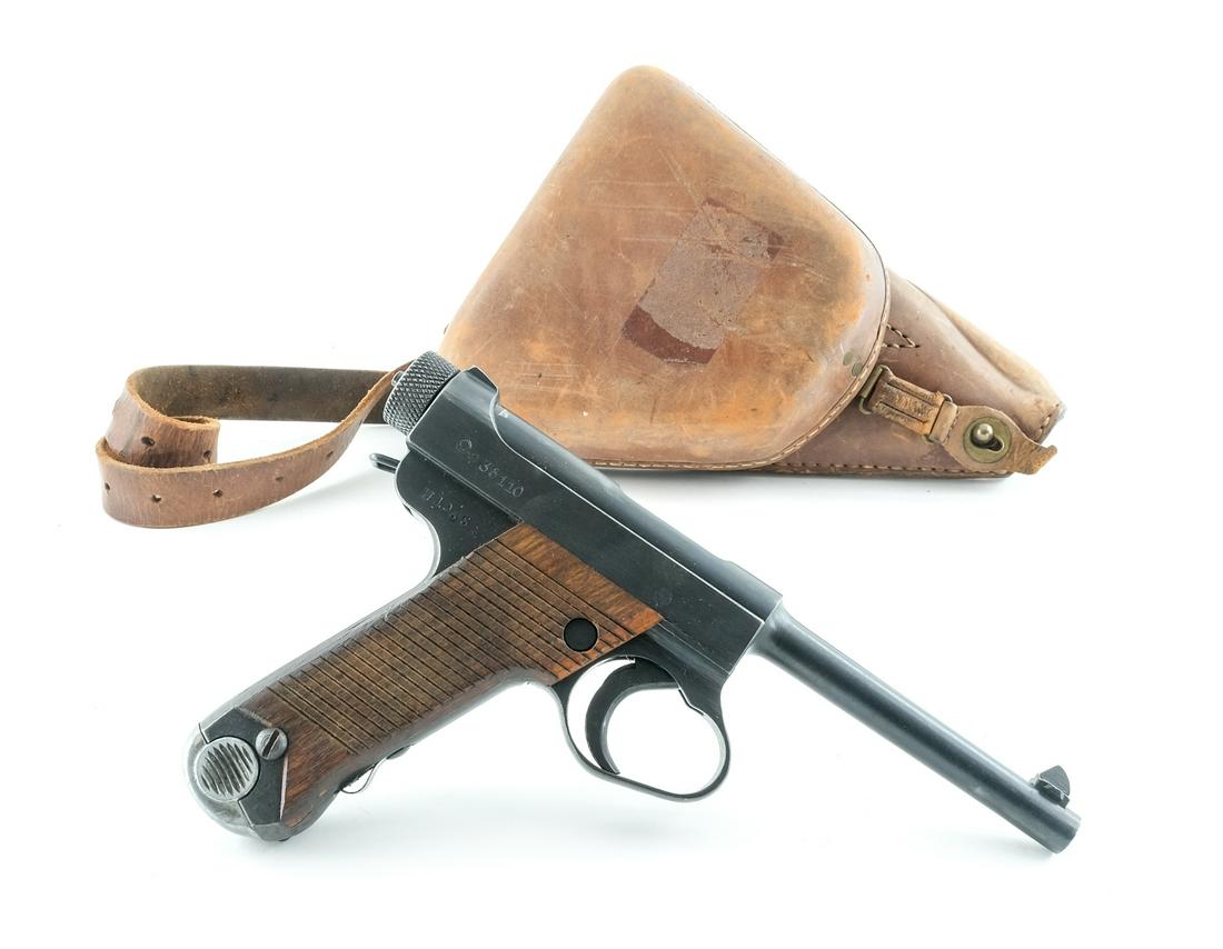 Japanese Nambu Type 14 8mm Nambu Pistol: Description Japanese Nambu Pistol Type 14 in 8x22mm Nambu with one, eight round removable magazine with a 4.5" barrel. Serrated wood grip plates. Blued frame, trigger, guard and barrel. Checkered rear