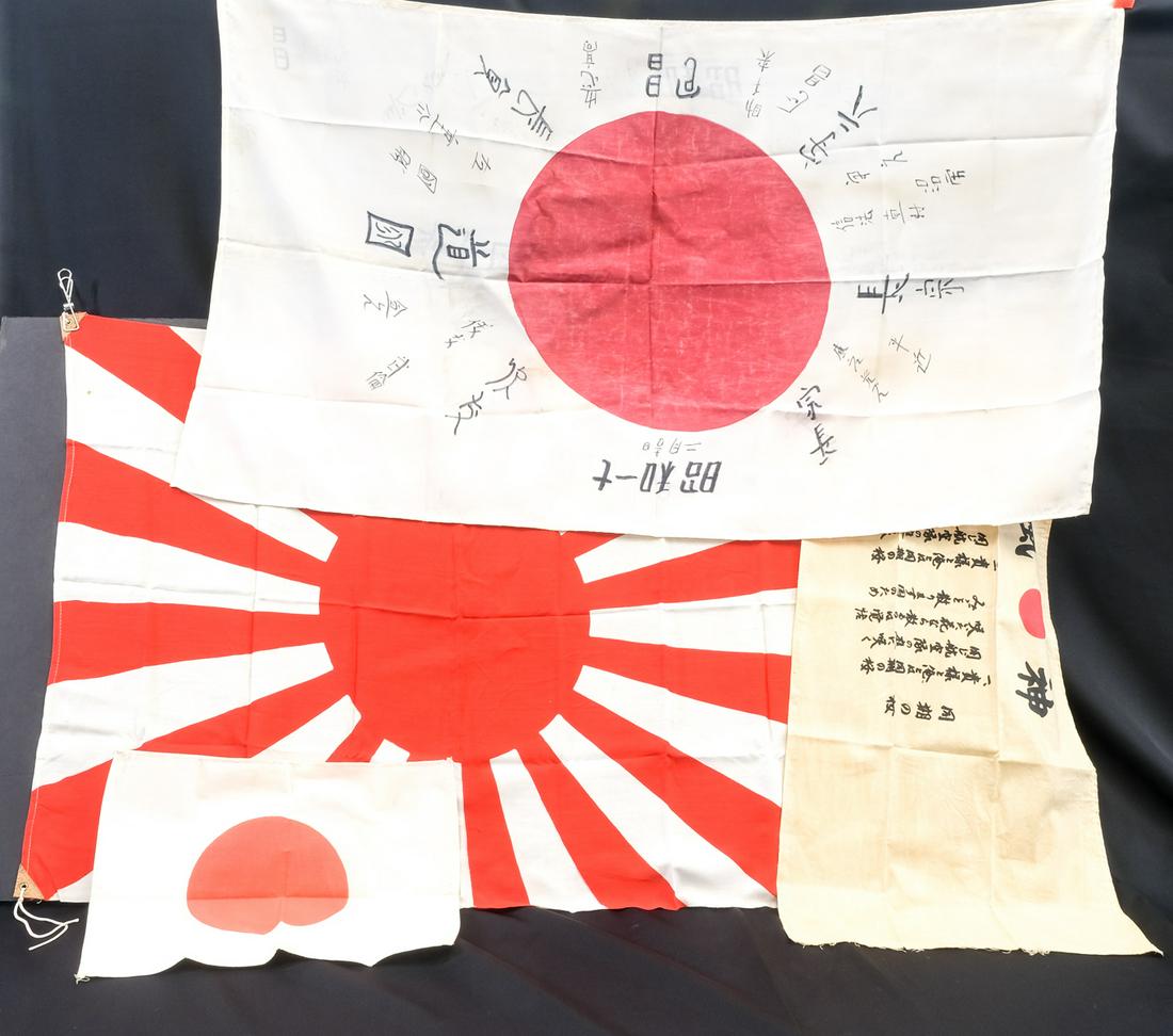Four Japanese WWII Flags: Description Estate-Found Japanese World War Two Flags. Largest dimension: 38" x 22" Hand-signed and hand-sewn silk flag with Japanese writing, Plus three cotton flag with printed designs. All Appear p