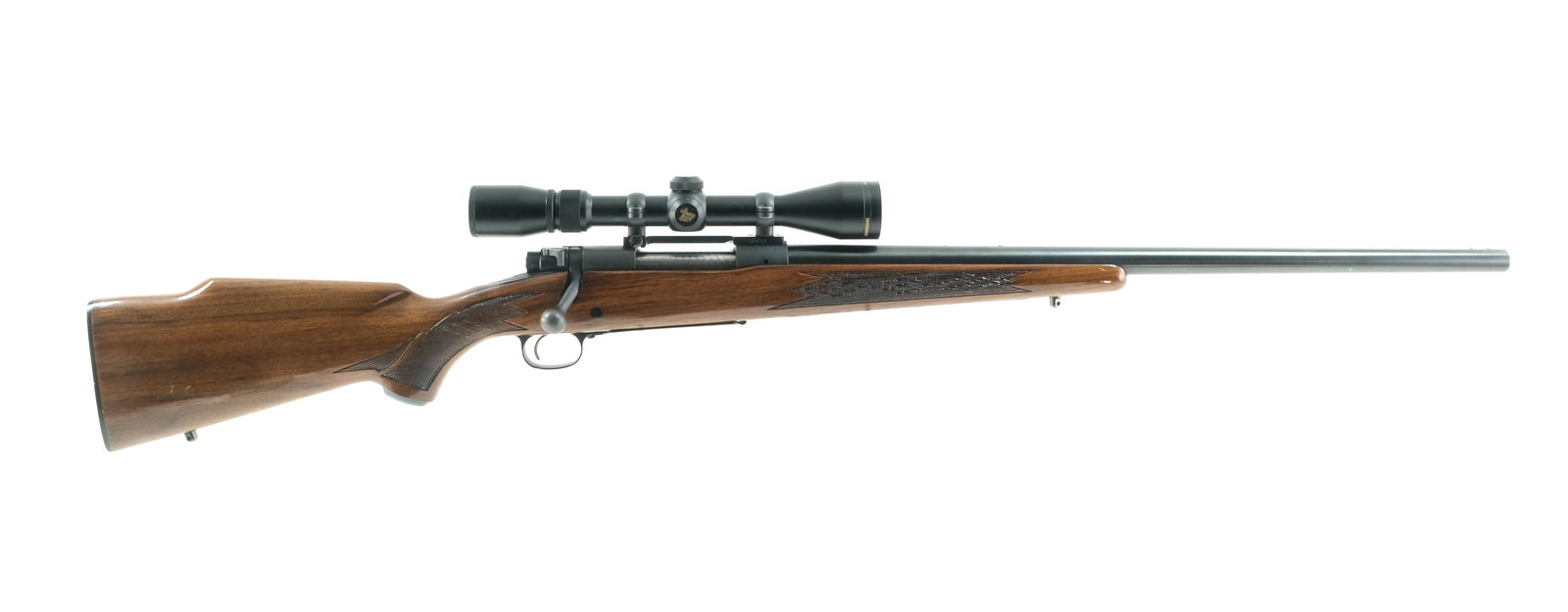Winchester 70 .243 Bolt Action Rifle: Description Winchester Model 70 in .243 Winchester with a four round internal magazine capacity and a 24" barrel. Checkered composite butt plate. Monte Carlo style checkered stock and front foregrip. 
