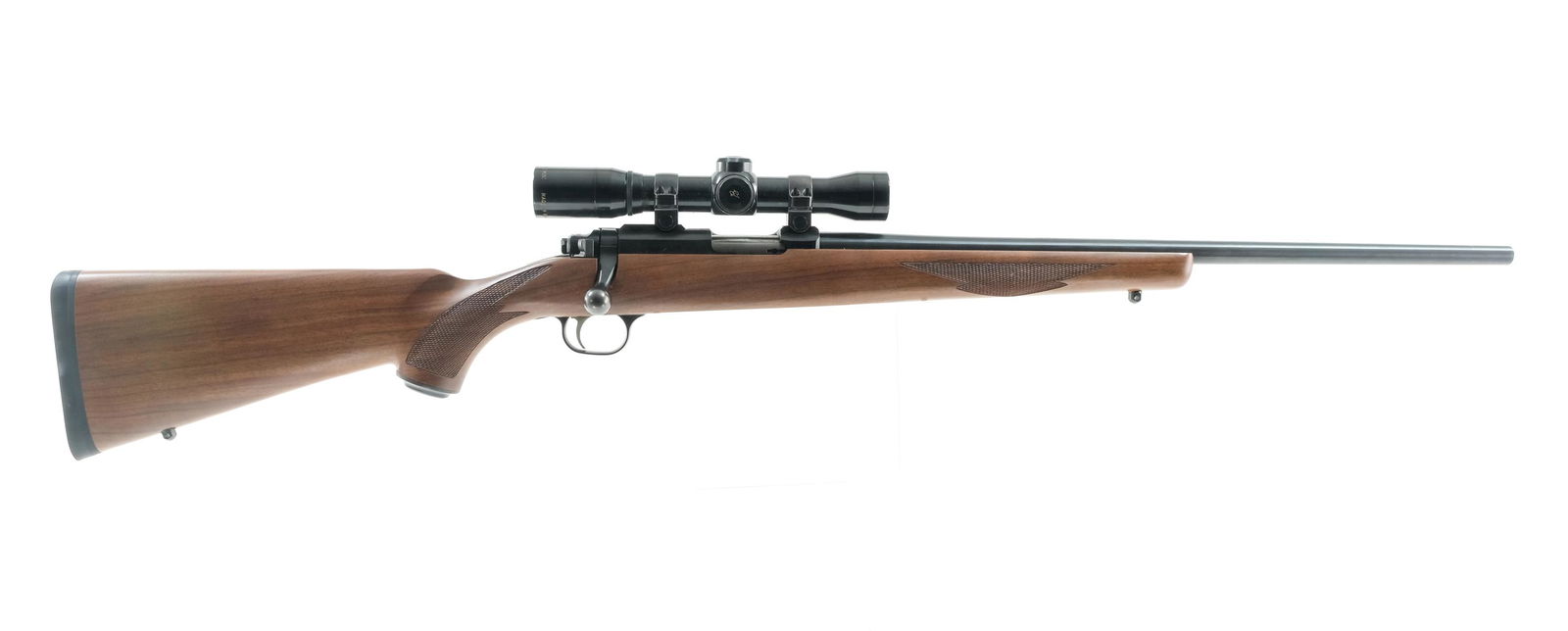 Ruger 77/22 22 WMR Bolt Action Rifle: Description Ruger Model 77/22 in .22 WMR (.22 mag) with one, ten round rotary magazine with a 20" tapered barrel. Ruger rubber butt pad. Checkered wood stock and front foregrip. Blued receiver, bolt h