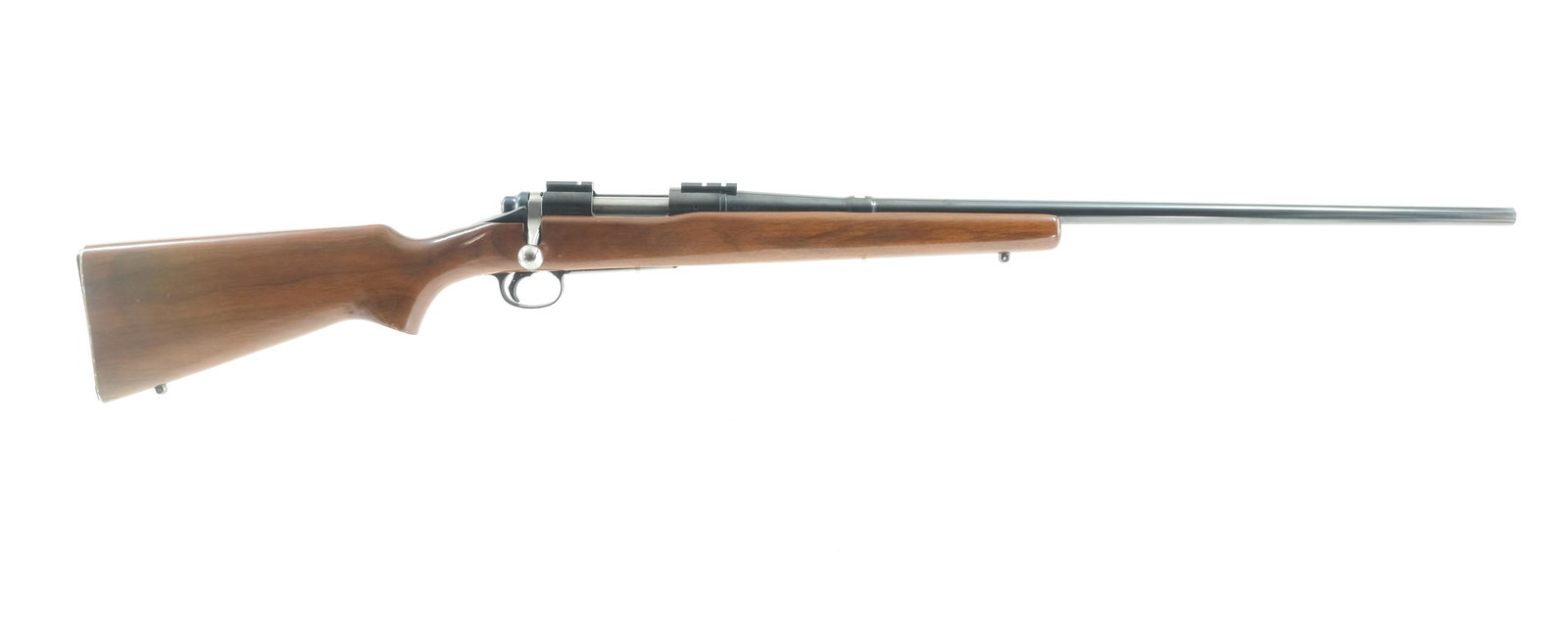 Remington 722 .222 Rem Bolt Action Rifle: Description Remington Model 722 in .222 Remington with a four round internal capacity with a 26" barrel. Remington serrated metal butt plate. Smooth wood stock and front foregrip. Blued receiver, serr
