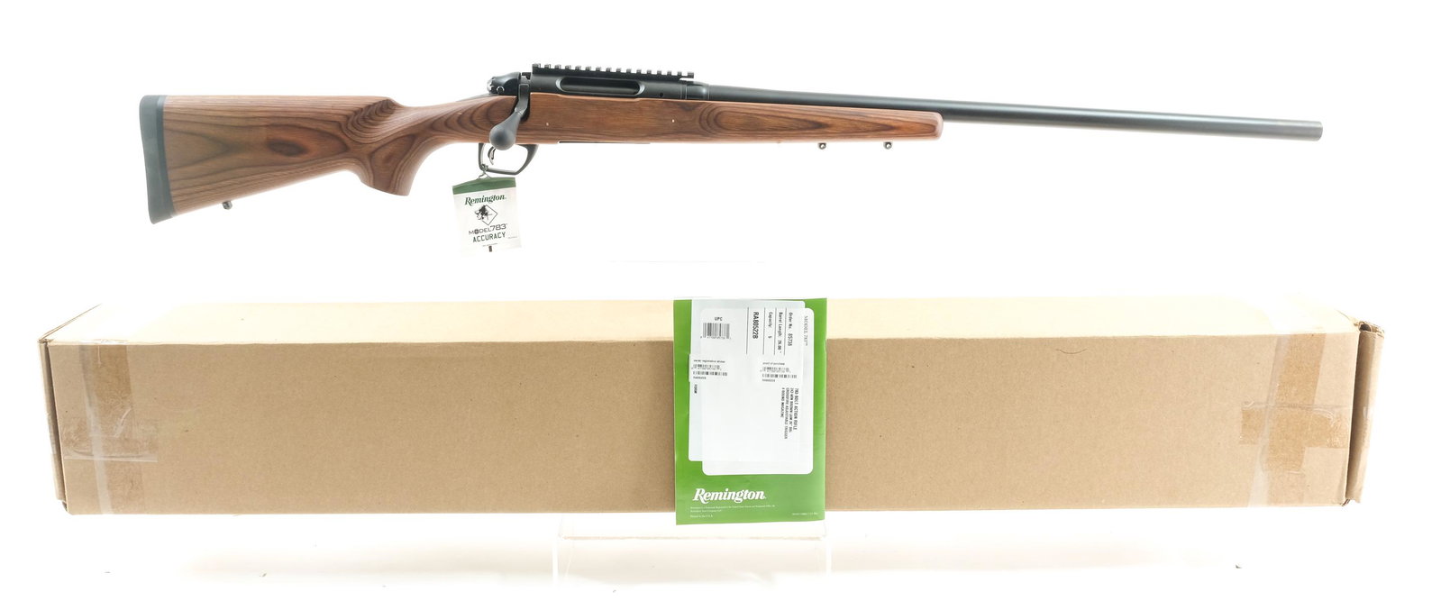 Remington 783 Varmint .243 Win Bolt Action Rifle: Description Remington Model 783 Varmint in .243 Winchester with one, four round removable magazine with a 26" heavy barrel. Remington rubber butt pad. Laminated smooth wood stock and front foregrip. B