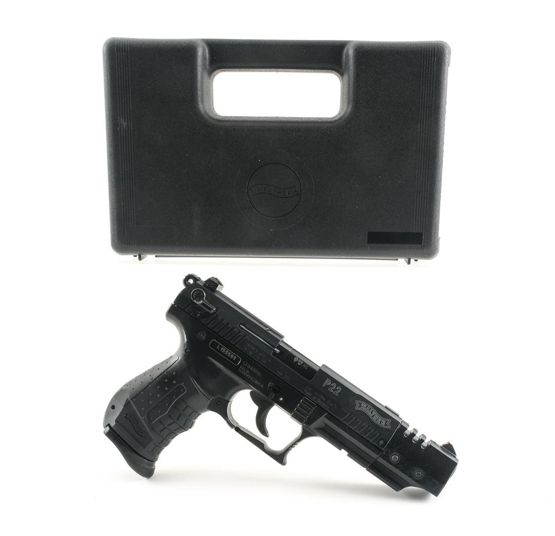 Walther P22 22 LR Semi Auto Pistol: Description Walther Model P-22 in .22 Long Rifle with one, ten round removable magazine and a 5" barrel. Made in Germany and imported by Smith & Wesson of Massachusetts. The barrel has a 1.5" compensa