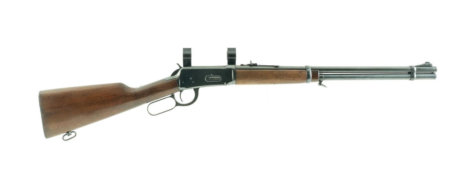 Winchester 94 .30-30 (1953) Lever Action Rifle: Description Winchester Model 94 in .30-30 Winchester with a five round internal magazine tube capacity and a 20" barrel. Checkered metal butt plate. Smooth wood stock and front foregrip. Blued hand le