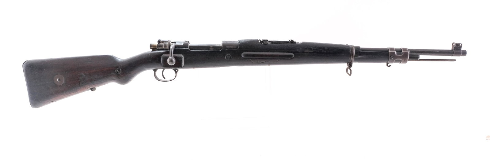 Brazilian Mauser 1908/34 Police Carbine: Description Brazilian Mauser Model 1908/34 Police Carbine in 7mm with a five round internal capacity and a 22" barrel. This rifle was made in Czech by Ceskoslovenska Zbrojovka AS.S. BRNO. for the Braz