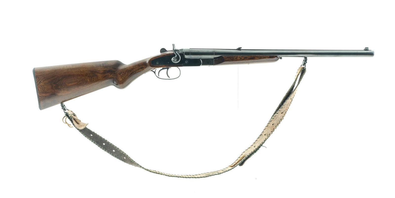 Rossi Overland 20ga Modern Shotgun: Description Interarms imported Amadeo Rossi hammer 20 gauge shotgun with rifle type sights. 20 1/4" solid rib barrel with white dot blade front sight, flip up semi buckhorn rear sight. Underside of ba