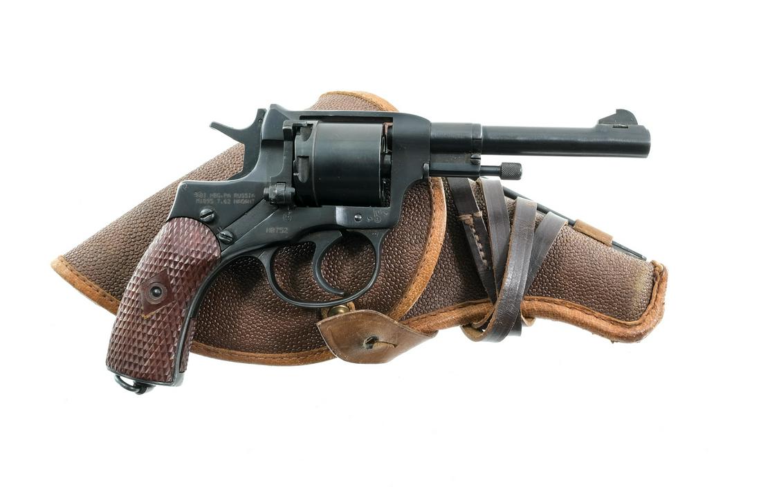 Russian Nagant 1895 7.62x38R Revolver: Description Russian Nagant Revolver Model 1895 in 7.62x38R with a seven round capacity and a 4.5" barrel. Made in Russia at the Izhevsk factory and import marked by KBI HBG PA. Checkered composite gri