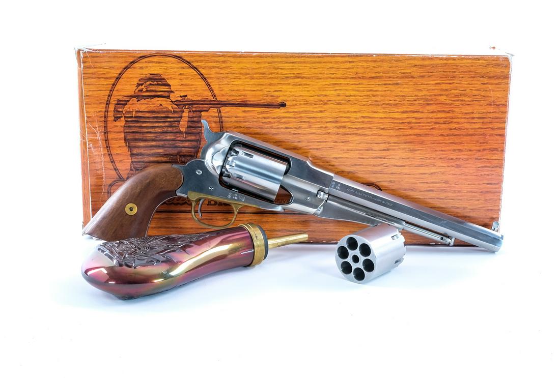 Pietta 1858 New Army .44 Cal BP Revolver: Description Pietta 1858 New Model Army in .44 caliber black powder with two six round cylinders and a 8" octagonal barrel. Made in Italy for Cabela's store. Smooth wood grip plates. Brass trigger guar