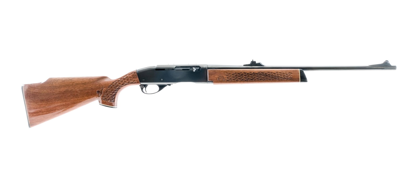 Remington Woodsmaster 742 308 Win Semi Auto Rifle: Description Remington Woodsmaster Model 742 in .308 Winchester missing its removable magazine with a 22" barrel. Checkered composite butt plate. Monte Carlo Style checkered wood stock and front foregr