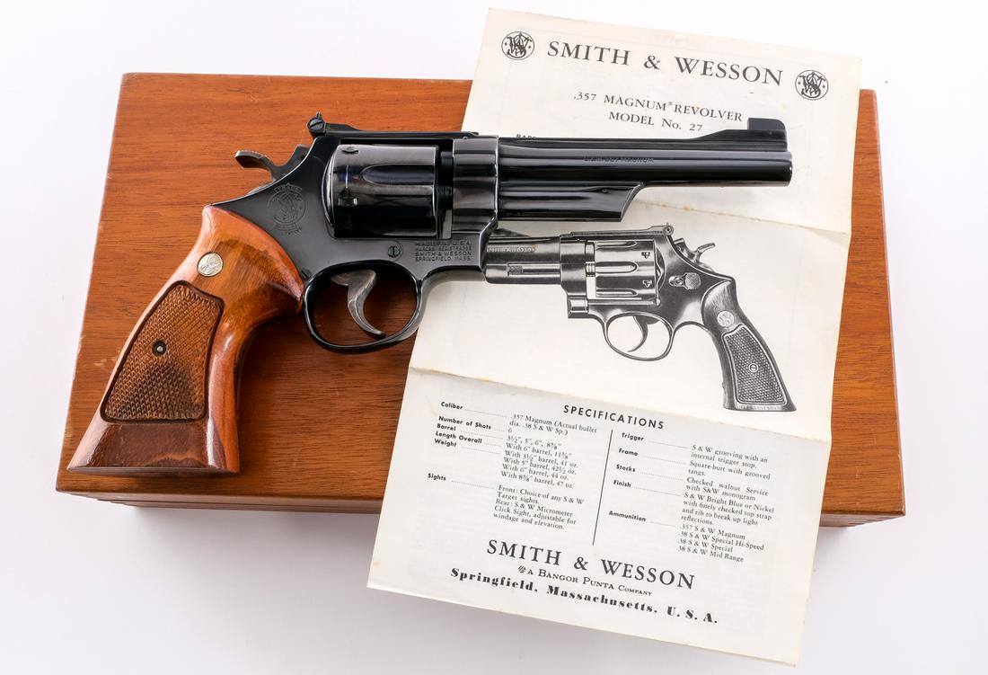S&W 27-2 .357 Mag Revolver: Description Smith & Wesson Model 27-2 in .357 Magnum with a six round capacity and a 6" barrel. Checkered wood Target grip plates. Case colored serrated Target trigger and checkered hammer. Blued fram