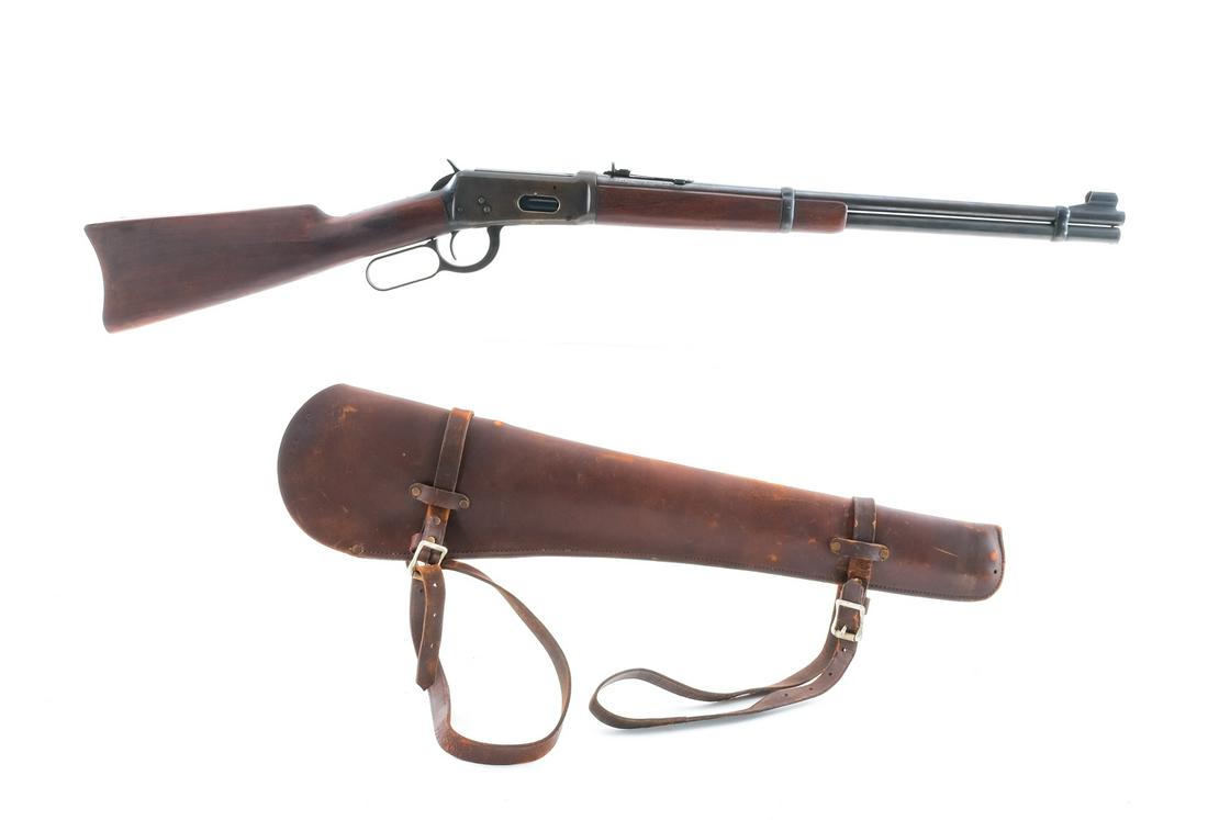 Winchester 94 .30 WCF Lever Action Rifle: Description Winchester Model 94 in .30 Winchester Center Fire which is .30-30 with a seven round capacity and a 20" barrel. Blued metal butt plate. Smooth wood stock and front foregrip. Blued hand lev