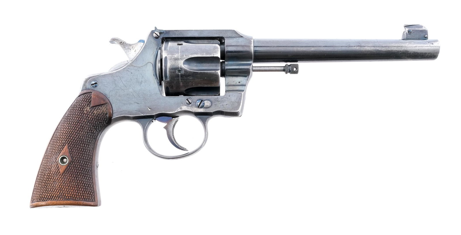 Colt Officers Model 1st Issue .38 Spl Revolver: Description Colt Officers Model First Issue in .38 Special with a six round capacity and a 6" barrel. Checkered walnut grip plates. Blued frame, cylinder, untextured trigger, checkered hammer and barr